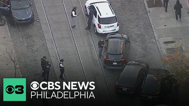 Philadelphia police officer struck by stolen car in East Germantown