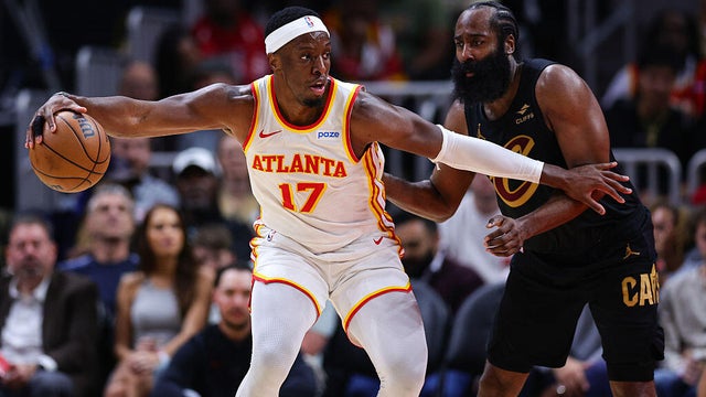 Hawks beat Cavaliers 114-111 to cap busy day at State Farm Arena