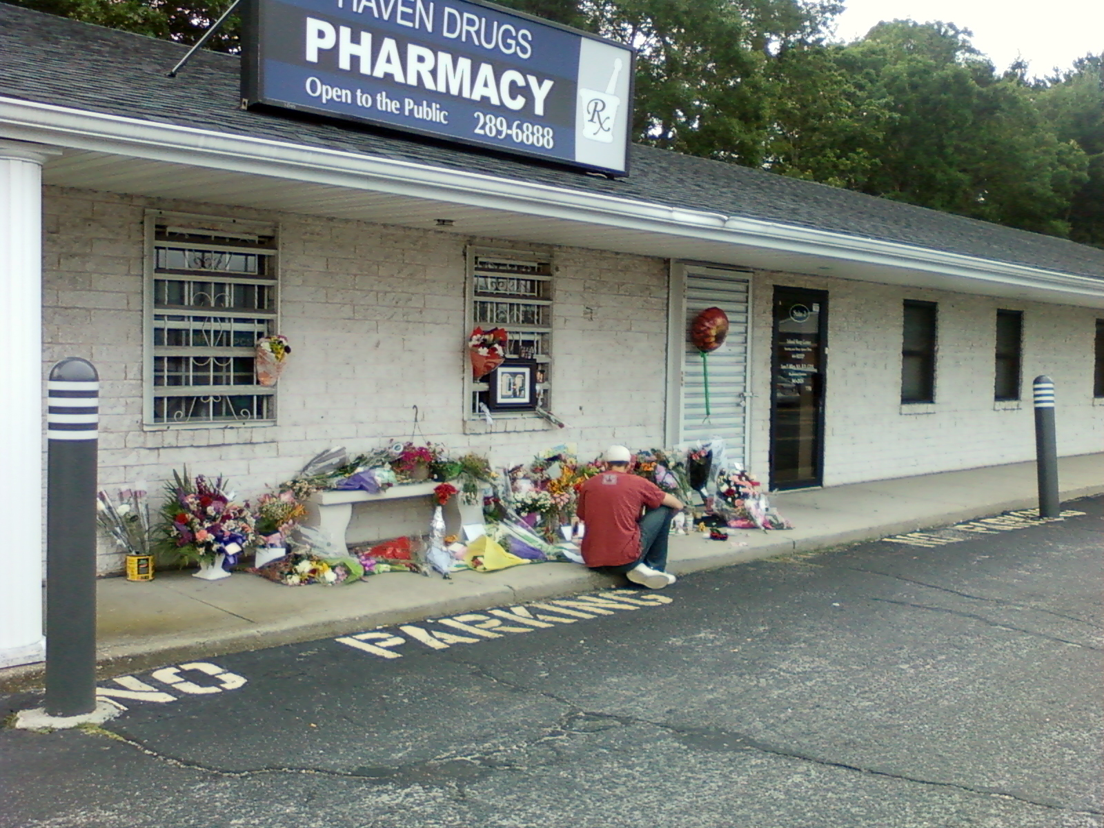 A makeshift memorial at Haven Drugs - Medford, NY - Jun 22, 2011 (credit: Mike Xirinachs / WCBS 880)