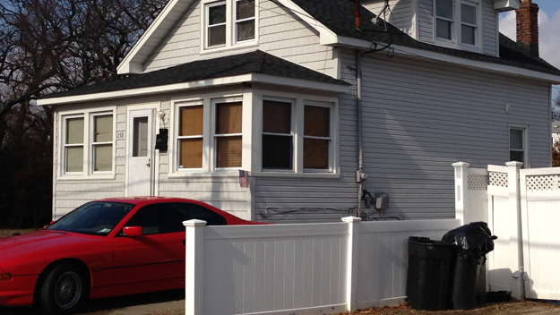 House in Lindenhurst where authorities said two females were held against their will and forced into prostitution. (credit: Mona Rivera/1010 WINS)