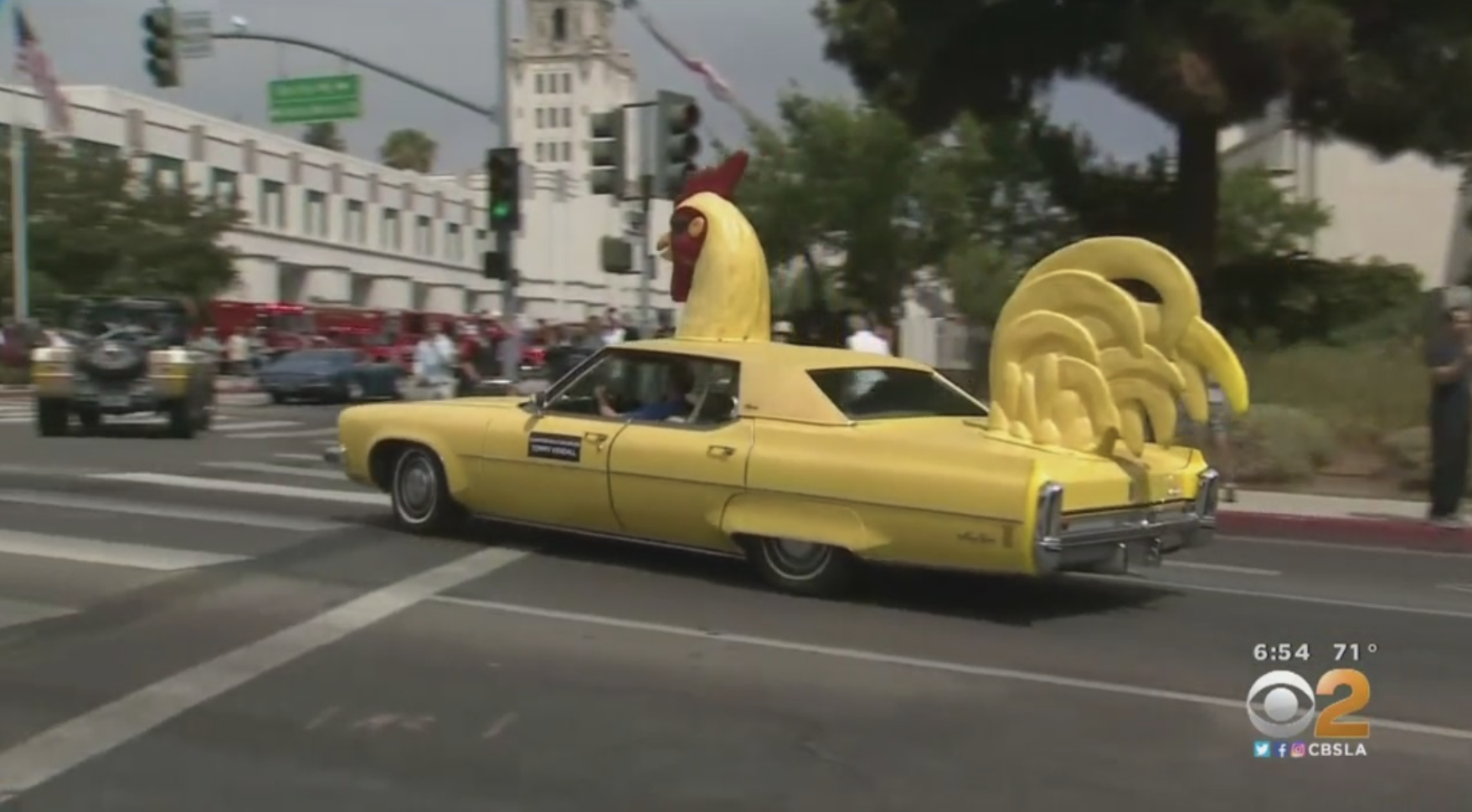 Spectators Line Up In Beverly Hills To Watch Parade Of Rare Cars, An