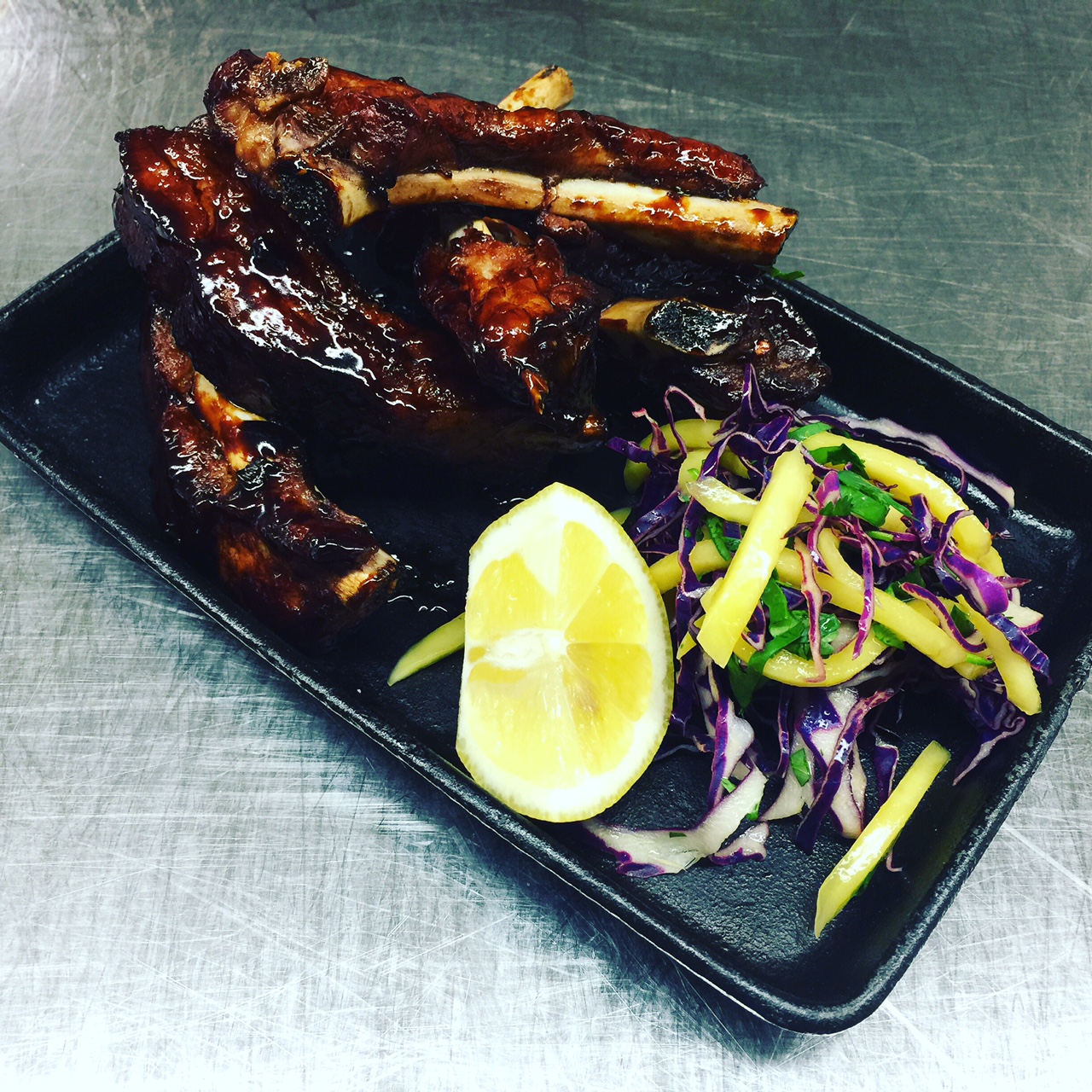 Chef Thomas Weibull's Baby Back Ribs, Glazed Adobo Style (credit: Foodie Chap/Liam Mayclem)