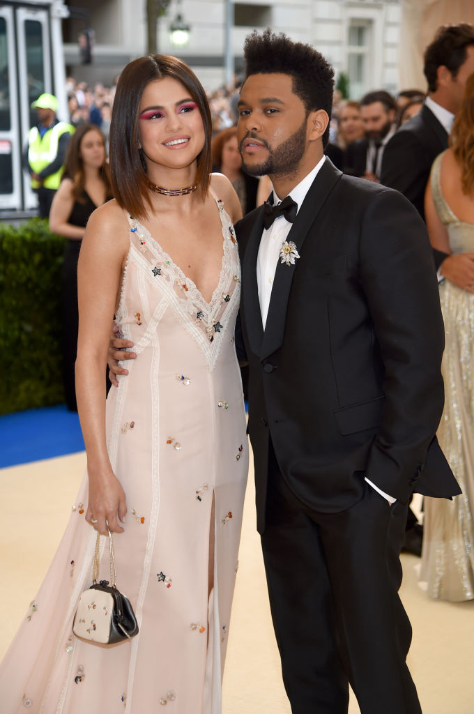 NEW YORK, NY - MAY 01: Selena Gomez and the Weeknd attend the 'Rei Kawakubo/Comme des Garcons: Art Of The In-Between' Costume Institute Gala at Metropolitan Museum of Art on May 1, 2017 in New York City. (Photo by Dimitrios Kambouris/Getty Images)