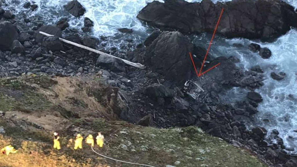 Driver Swims From Burning Wreckage After Car Plunges Off Cliff Into