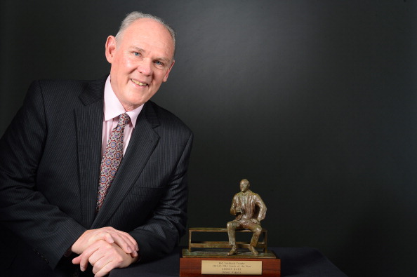 George Karl of the Denver Nuggets poses for a photo with the Red Auerbach Trophy after being named 2012-2013 NBA Coach of the Year on May 8, 2013 at the Pepsi Center. (credit: Garrett W. Ellwood/NBAE via Getty Images)