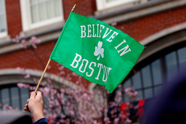 BOSTON, MA - APRIL 20: Fans hold a sign outside of Fenway Park tohonor the Marathon bombing victims, before a game the Kansas City Royals at Fenway Park on April 20, 2013 in Boston, Massachusetts.  