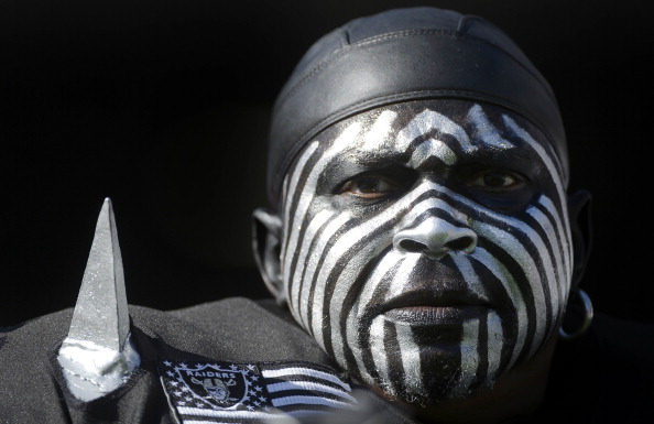 SAN DIEGO, CA - DECEMBER 22:  "The Violator", an Oakland Raiders fan, looks on from the stands during a game against the San Diego Chargers on December 22, 2013 at Qualcomm Stadium in San Diego, California. 
