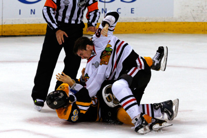 Andrew Shaw and Brad Marchand  (Photo by Jim Rogash/Getty Images) 
