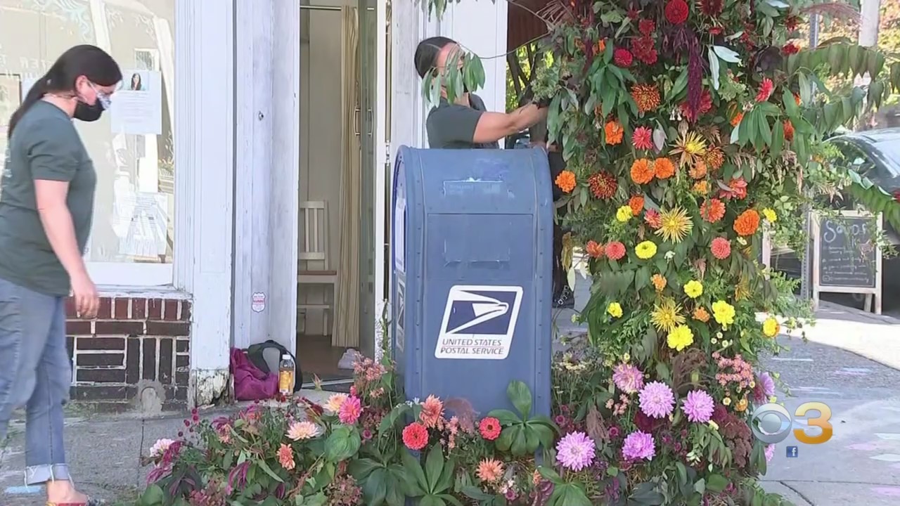 'United By Blooms' Installs Floral Designs Citywide To Encourage Voting, Support USPS