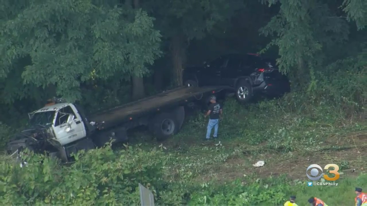 Car Carrier Goes Down Embankment Following Crash In Doylestown