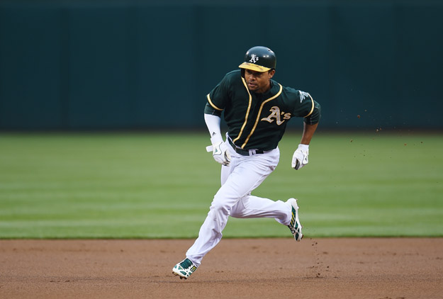 OAKLAND, CA - MAY 30:  Coco Crisp #4 of the Oakland Athletics runs the bases against the Los Angeles Angeles of Anaheim in the bottom of the first inning at O.co Coliseum on May 30, 2014 in Oakland, California.  