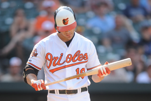 BALTIMORE, MD - JUNE 29:  Chris Davis #19 of the Baltimore Orioles reacts after striking out in the eight inning during a baseball game against the Tampa Bay Rays on June 29, 2014 at Oriole Park at Camden Yards in Baltimore, Maryland.  The Ray won 12-7.  
