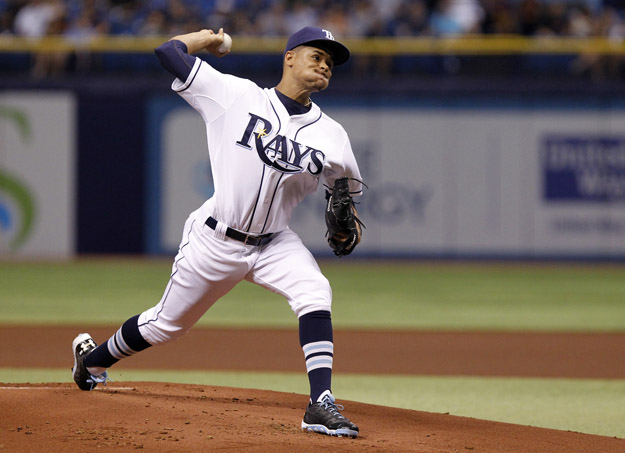 ST. PETERSBURG, FL - AUGUST 19:  Chris Archer #22 of the Tampa Bay Rays pitches during the first inning of a game against the Detroit Tigers on August 19, 2014 at Tropicana Field in St. Petersburg, Florida.