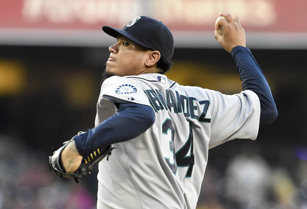 SAN DIEGO, CA - JUNE 18:  Felix Hernandez #34 of the Seattle Mariners pitches during the first inning of  a baseball game against the San Diego Padres at Petco Park June 18, 2014 in San Diego, California.  