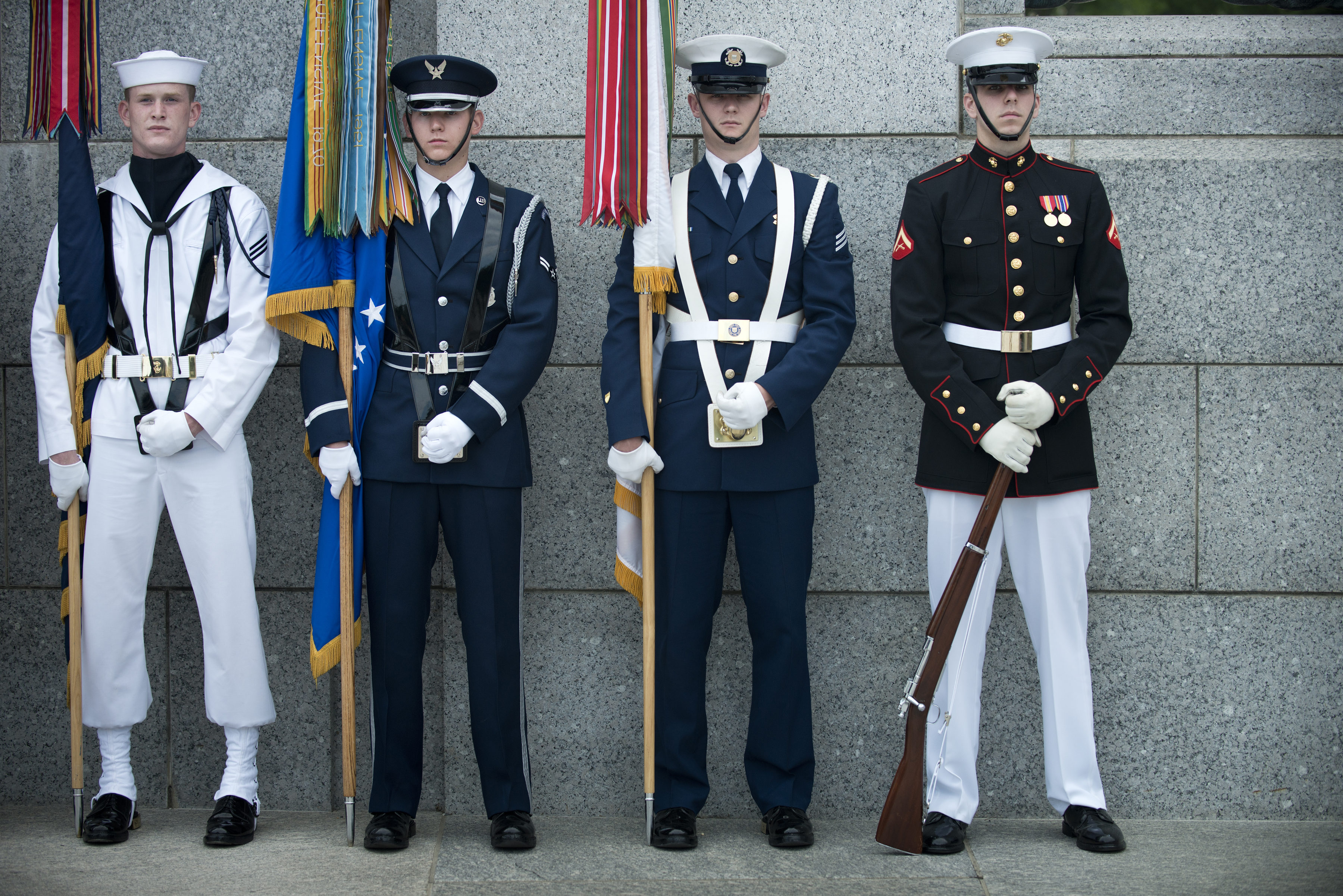 A US Military color guard stands ready f