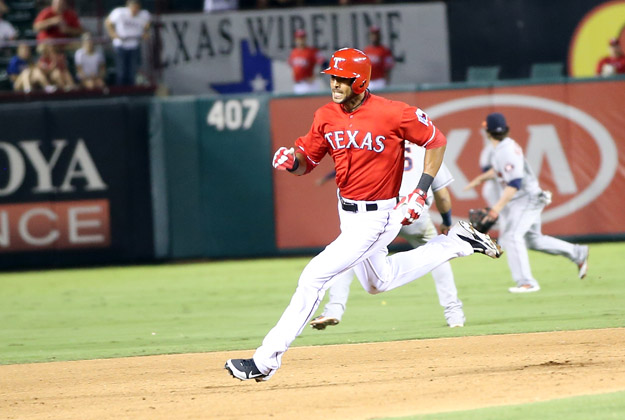 ARLINGTON, TX - SEPTEMBER 23: Alex Rios #51 of the Texas Rangers rounds second base after hitting an RBI triple in the sixth inning to complete a cycle during a game against the Houston Astros at Rangers Ballpark in Arlington on September 23, 2013 in Arlington, Texas. Rios hit a two-run double in the first inning, a single in the third, and a solo home run in the fourth. 