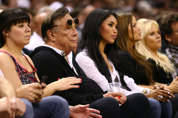 SAN ANTONIO, TX - MAY 19:  (2nd L) Team owner Donald Sterling of the Los Angeles Clippers and V. Stiviano watch the San Antonio Spurs play against the Memphis Grizzlies during Game One of the Western Conference Finals of the 2013 NBA Playoffs at AT&T Center on May 19, 2013 in San Antonio, Texas.