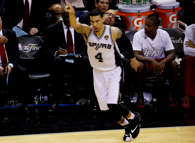 SAN ANTONIO, TX - JUNE 05: Danny Green #4 of the San Antonio Spurs reacts after hitting a shot against the Miami Heat during Game One of the 2014 NBA Finals at the AT&T Center on June 5, 2014 in San Antonio, Texas.