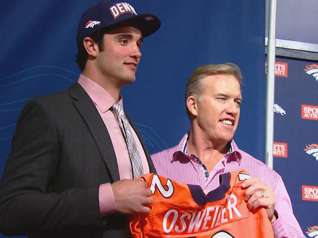 The Broncos picked quarterback Brock Osweiler in the second round of the 2012 NFL Draft. He posed on April 28, 2012, with John Elway at Broncos headquarters. (credit: CBS)