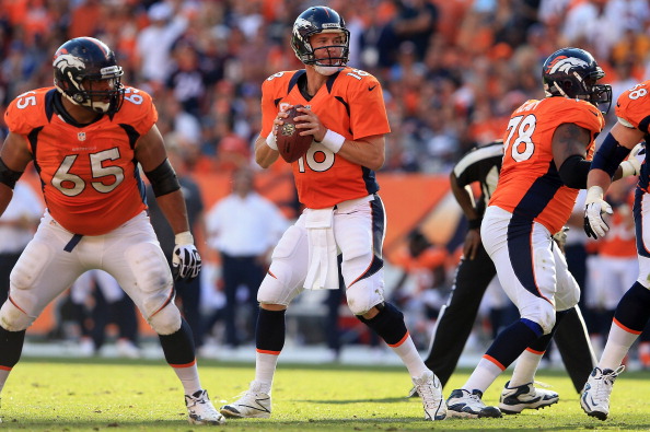 DENVER, CO - SEPTEMBER 30: Quarterback Peyton Manning #18 of the Denver Broncos drops back to pass against the Oakland Raiders at Sports Authority Field at Mile High on September 30, 2012 in Denver, Colorado. The Broncos defeated the Raiders 37-6. (Photo by Doug Pensinger/Getty Images)