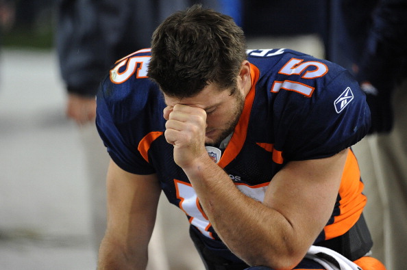 DENVER, CO - NOVEMBER 17: Tim Tebow #15 of the Denver Broncos prays during the final minute of the game against the New York Jets at Sports Authority Field at Mile High on November 17, 2011 in Denver, Colorado. (Photo by Garrett W. Ellwood/Getty Images)