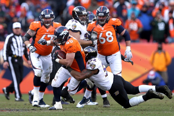 DENVER, CO - JANUARY 12: Jacob Hester #40 of the Denver Broncos runs with the ball against Ray Lewis #52 of the Baltimore Ravens during the AFC Divisional Playoff Game at Sports Authority Field at Mile High on January 12, 2013 in Denver, Colorado. (Photo by Jeff Gross/Getty Images)
