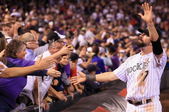 DENVER, CO - SEPTEMBER 25: Todd Helton #17 of the Colorado Rockies greets the fans after he played his last home game at Coors Field on September 25, 2013 in Denver, Colorado. The Boston Red Sox defeated the Rockies 15-5. (Photo by Doug Pensinger/Getty Images) 