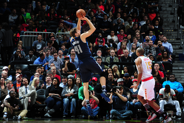 Dirk Nowitzki #41 of the Dallas Mavericks shoots the ball against the Atlanta Hawks on February 1, 2016 at Philips Arena in Atlanta, Georgia.