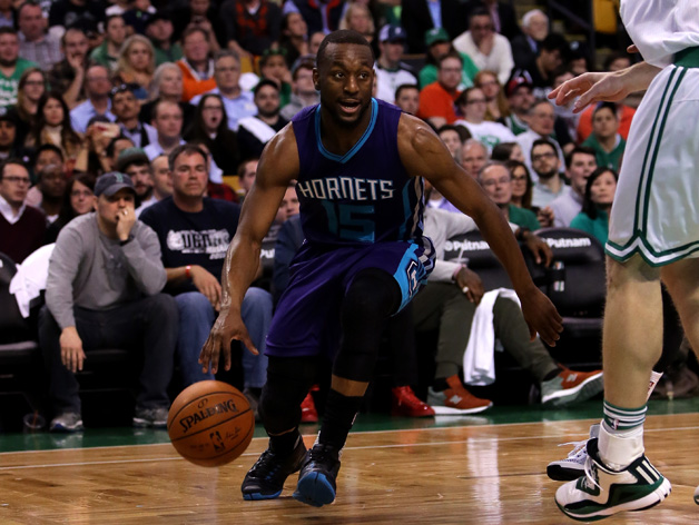 Kemba Walker #15 of the Charlotte Hornets drives with the ball against the Boston Celtics in the first half at TD Garden on April 11, 2016 in Boston, Massachusetts.