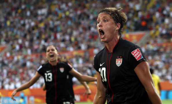 Abby Wambach of USA celebrates after scoring her team's equalizing goal during the FIFA Women's World Cup 2011 Quarter Final match between Brazil and USA at Rudolf-Harbig-Stadion on July 10, 2011 in Dresden, Germany.