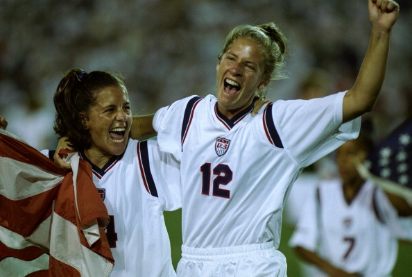 The women's soccer team from the USA celebrate their 2-1 victory over China to take the gold medal at Sanford Stadium in Athens, Georgia at the 1996 Centennial Olympic Games.