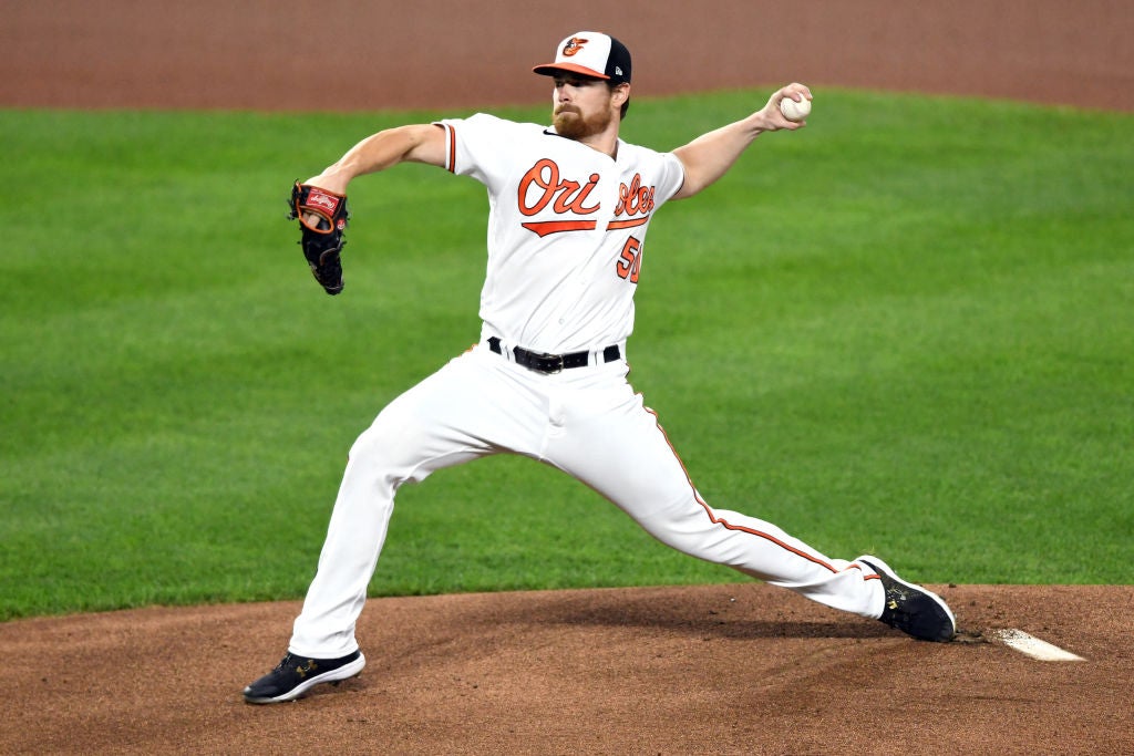 Baltimore Orioles relief pitcher Bruce Zimmermann watches the ball