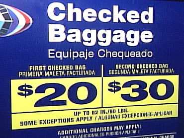 Curious Why Airlines Haven't Dropped Baggage Fees
