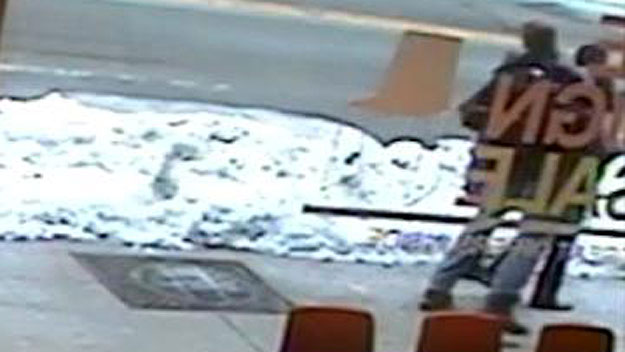 A man seen in this surveillance image sucker punched a man on Mass. Ave in Cambridge, Feb. 15. (Image courtesy: BoConcept)