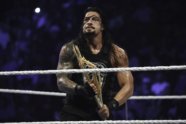Roman Reigns looks on during the WWE Smackdown on September 1, 2015 at the American Airlines Arena in Miami, Florida. 
